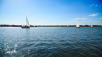 Sailboats compete in a sail regatta, race of sailboats