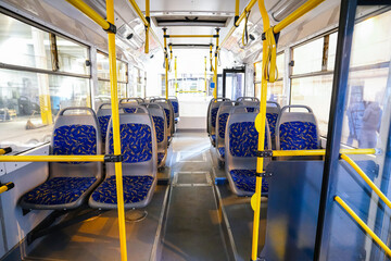 Empty bus interior. Seats without passengers. Public transport.