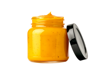 Mustard in clear glass jar isolated on white transparent background.