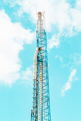 Cell tower with a view of the sky.