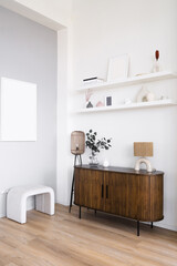 Modern living room design featuring wooden cabinet and minimalist decor in natural light