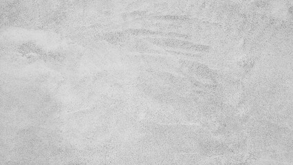 A grey wall with a few brush strokes on it. The wall is very plain and has no decoration