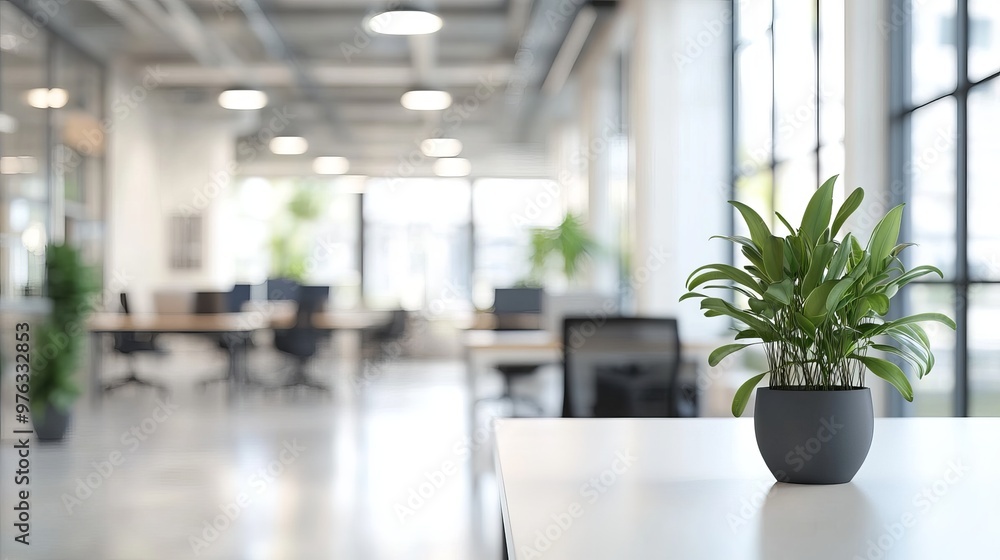 Poster blurred image of a white open space office interior suitable for use as a background