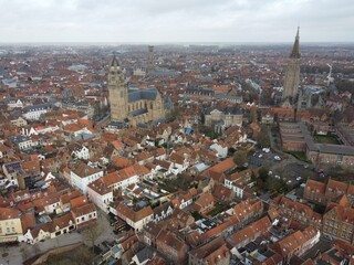 Fototapeta premium Brugge from an aerial perspective, highlighting its historical charm, architectural beauty, and scenic waterways 