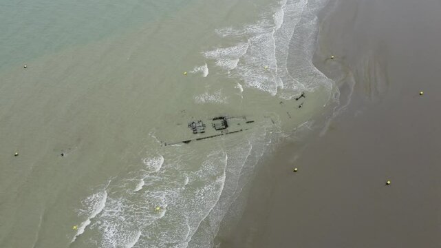 Visual drama of a battleship on Dunkirk&rsquo;s beach from an aerial perspective visual drama of a battleship on Dunkirk&rsquo;s beach from an aerial perspective