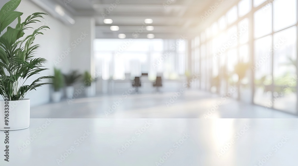 Poster blurred image of a white open space office interior suitable for use as a background