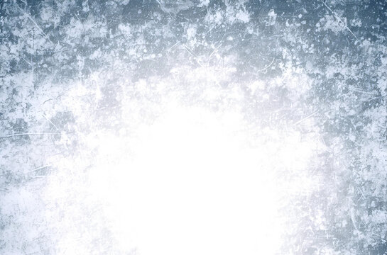 Grunge texture with a frosty blue overlay creates a vintage, weathered background with a transparent center