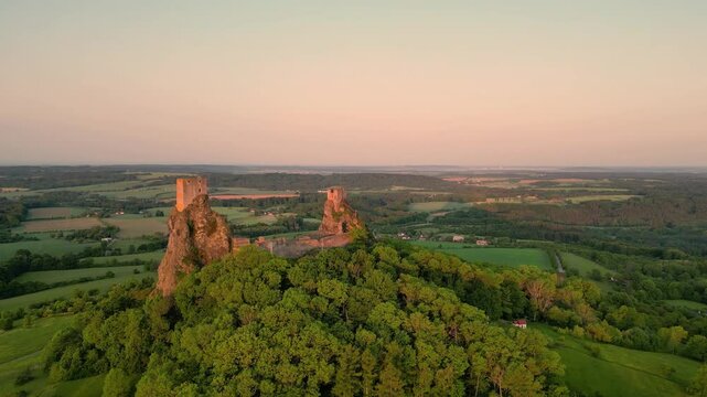 Trosky medieval castle ruins with two ancient towers. Bohemian Paradise, Czech: Cesky raj, Czechia. Aerial 4K footage from above