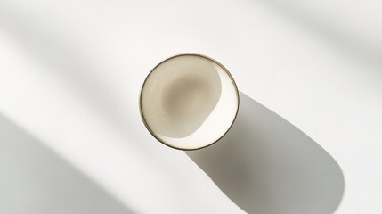 A minimalist food photograph, featuring a single ingredient on a white surface