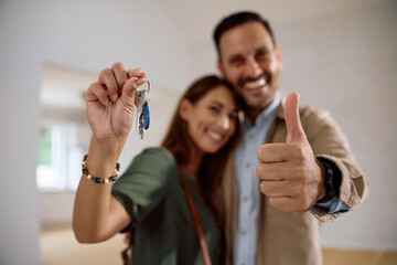 Close up of couple buying their first real estate.