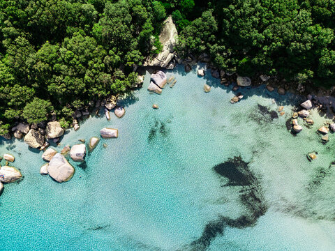 Turquoise lagoon and Santa Giulia beach in Corsica, top view.