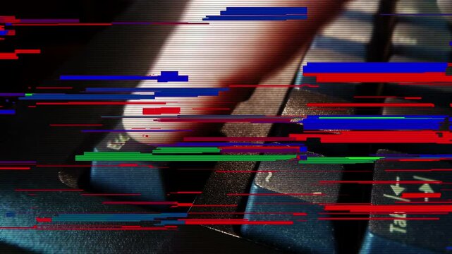 Esc key pressing on computer keyboard with glitch effect. Finger presses Escape button. Concept of interruption, abort, problem or cyber attack.