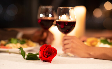 Romantic Evening Date. Hands Clinking Glasses On Served Restaurant Table. Shallow Depth, Selective...