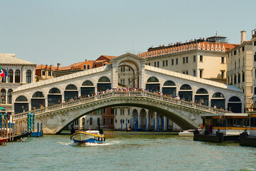 Venice and its buildings,canals,gondolas,and sculptures