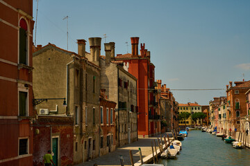 Venice and its canals, boats,sculptures and birds. 