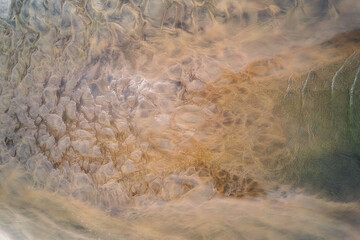 Aerial view of the beautiful beach texture after low tide
