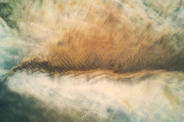 Aerial view of the beautiful beach texture after low tide