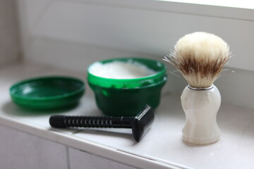 Retro style beard grooming equipment arranged on a surface.
