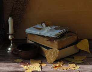 still life with candle and book