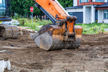 Excavator at Residential Construction Site in Mission, British Columbia, Canada