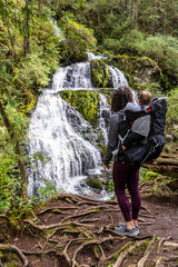 Mother Hiking with Baby in Backpack, Scenic Waterfall, Mission, British Columbia, Canada