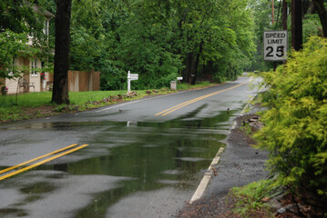 small county road after the rain in Nothern USA