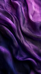 Fototapeta premium Purple silk fabric with soft folds, abstract texture. Luxury textile and fashion concept