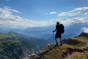 Obraz premium On Top of the World: A Moment of Reflection in the Mountains