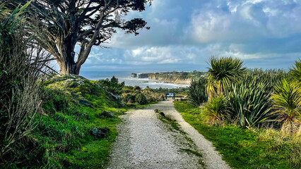 Rugged beach and costal scene on the cliffside walk by the ocean
