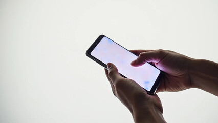 Close up of a person using mobile smart phone, widescreen 16:9, 300 dpi, with free space for text