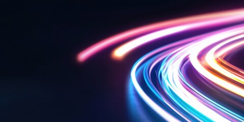 Naklejka premium Curved trails of multicolored lights create a dynamic pattern against a dark background, representing motion and energy in a visually striking, abstract artistic portrayal of speed.