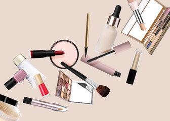 Different makeup products flying on beige background