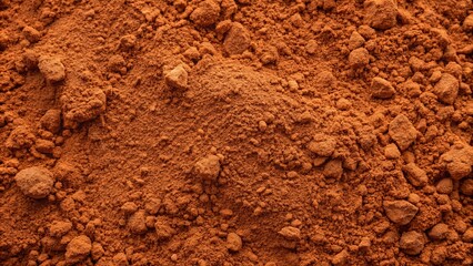 Fototapeta premium Terracotta powder soil with clay-like texture background for natural and earthy aesthetic