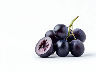 Fototapeta premium Fresh, juicy grapes displaying deep purple hues, perfect for healthy desserts or snacks, showcasing vibrant natural beauty.
