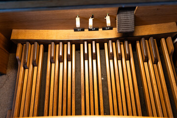 Top view of organ pedals in Catholic Church.