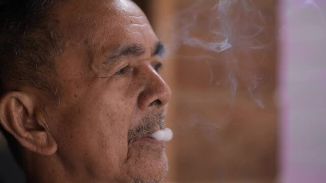 An Old Man Smoking