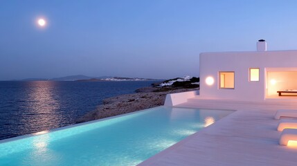 Modern Villa with Infinity Pool and Ocean View at Night