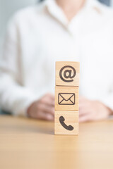 Contact Us concepts. Wood block of Email, call Phone and Website Address sign. For Customer support...