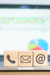 Contact Us concepts. Wood block of Email, call Phone and Website Address sign. For Customer support...