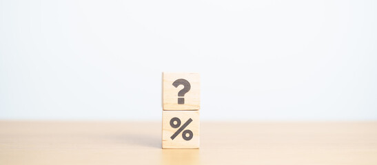 wood block of Question mark and Percentage. Interest rate, GDP, stocks market, financial, deflation and Inflation, ranking, mortgage, debt, Loan and Economic Recession