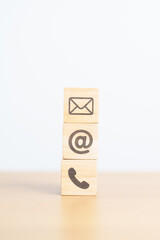 Contact Us concepts. Wood block of Email, call Phone and Website Address sign. For Customer support...