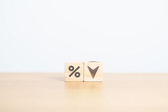 wood block of percentage change to UP and Down arrow. Interest rate, GDP, stocks market, financial, deflation and Inflation, ranking, mortgage, debt, Loan and Economic Recession concept