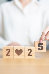 Happy New Year 2025 with heart block for health care, love, organ donation, resolution, charity, happy family, wellbeing and insurance concepts