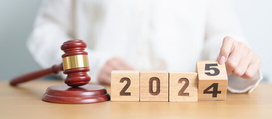 2024 end year to Happy New Year 2025 with judge gavel on table. Law, lawyer, judgment, justice...