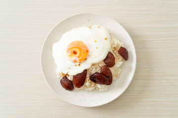 rice with fried egg and Chinese sausage