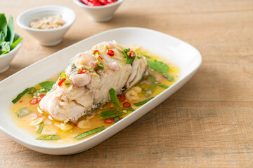 steamed sea bass fish with herbs