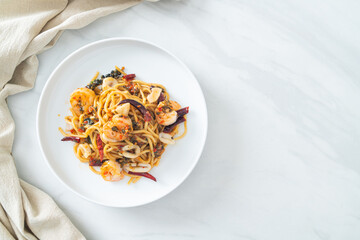 spicy spaghetti seafood on plate