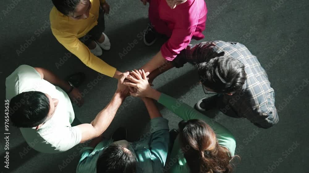 Poster top down view of smart business team working together and putting hands together. aerial view of gro