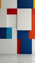 Abstract geometric wall art featuring colorful blocks in red, blue, yellow, and white at a contemporary gallery space