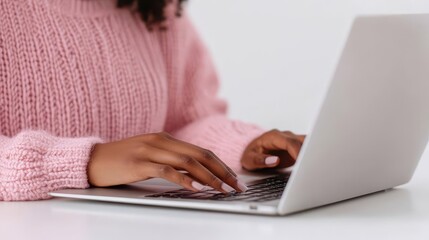 Fototapeta premium A close-up of a student typing on a laptop during an online research assignment, student, typing, online research